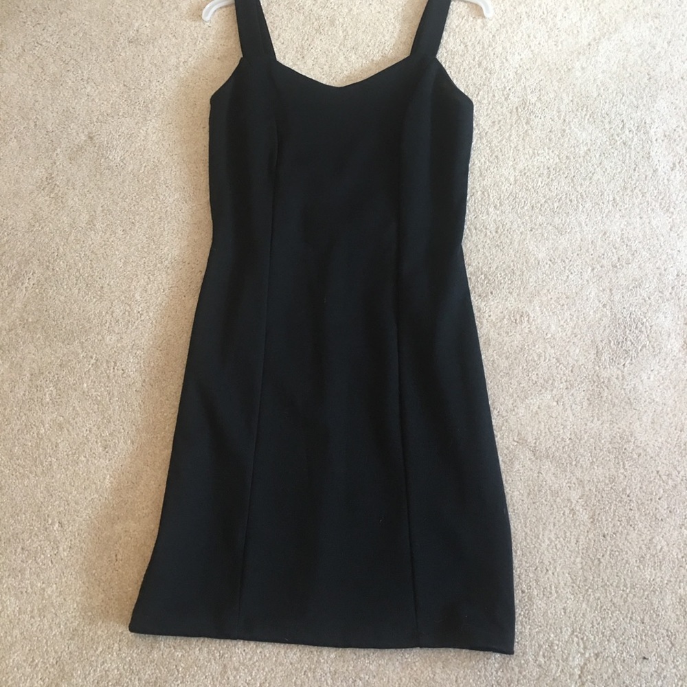Black (caged back) mini dress 👗